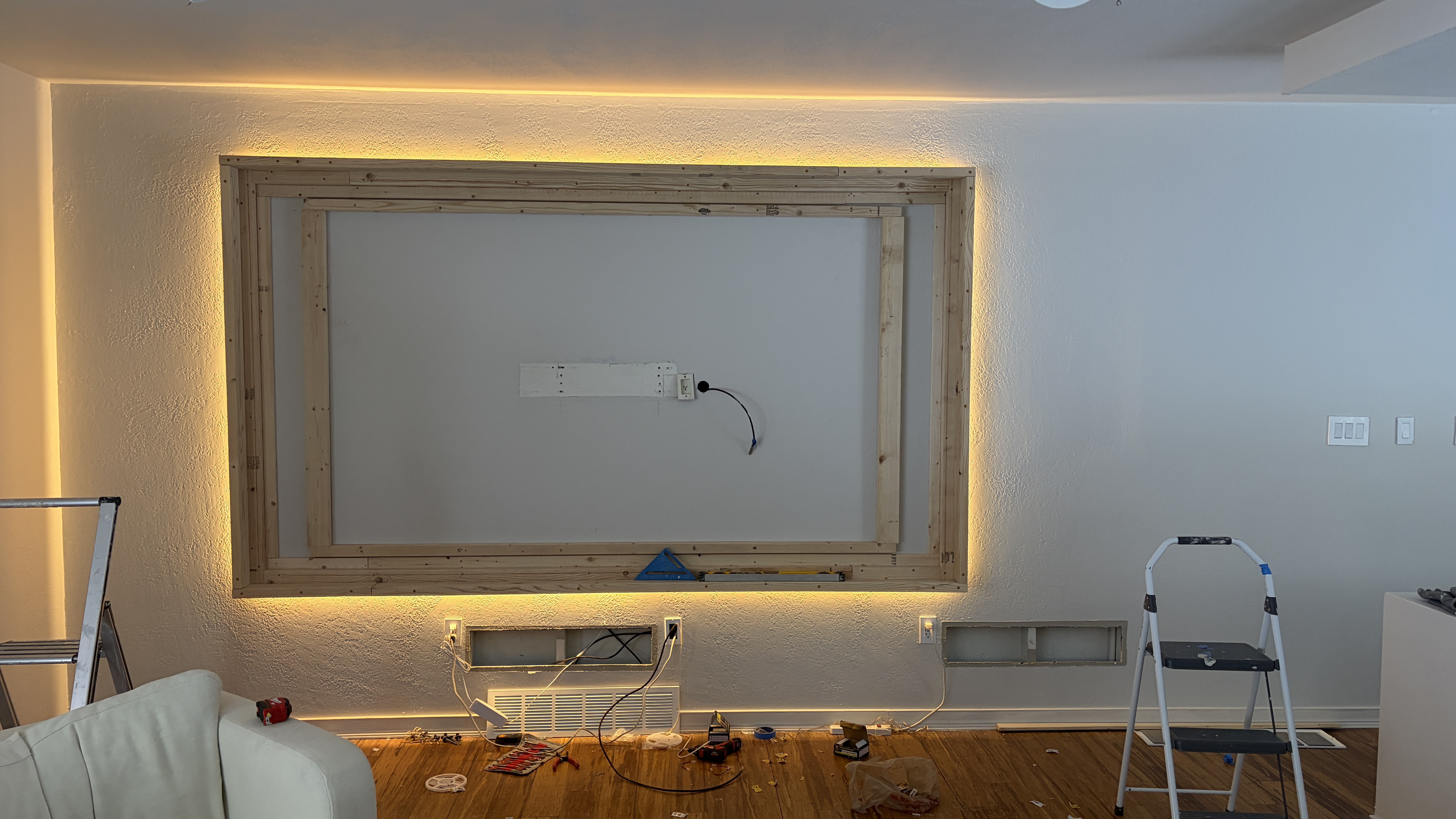 Custom Media Wall with Recessed TV & Halo Lighting