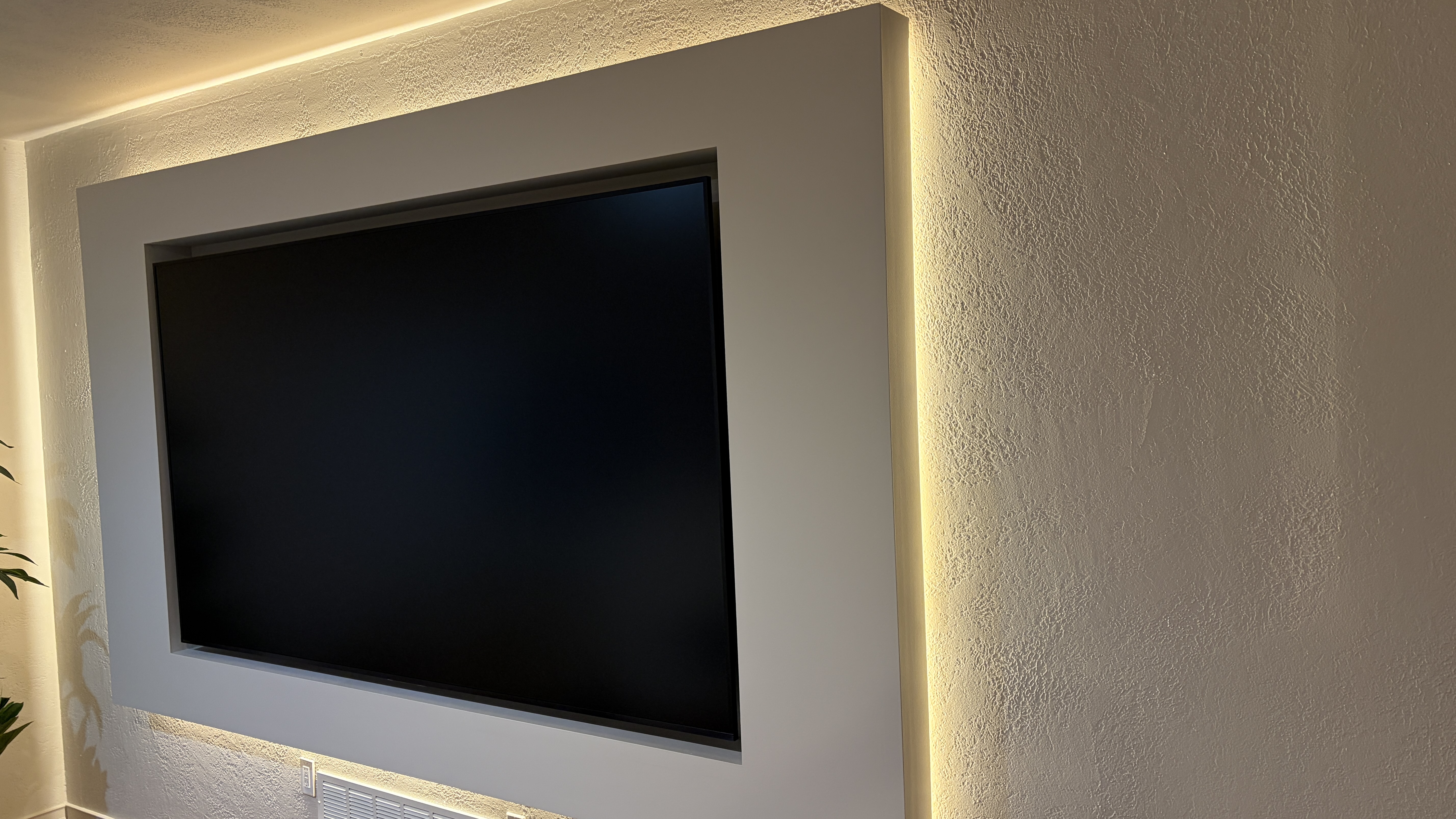 Custom Media Wall with Recessed TV & Halo Lighting