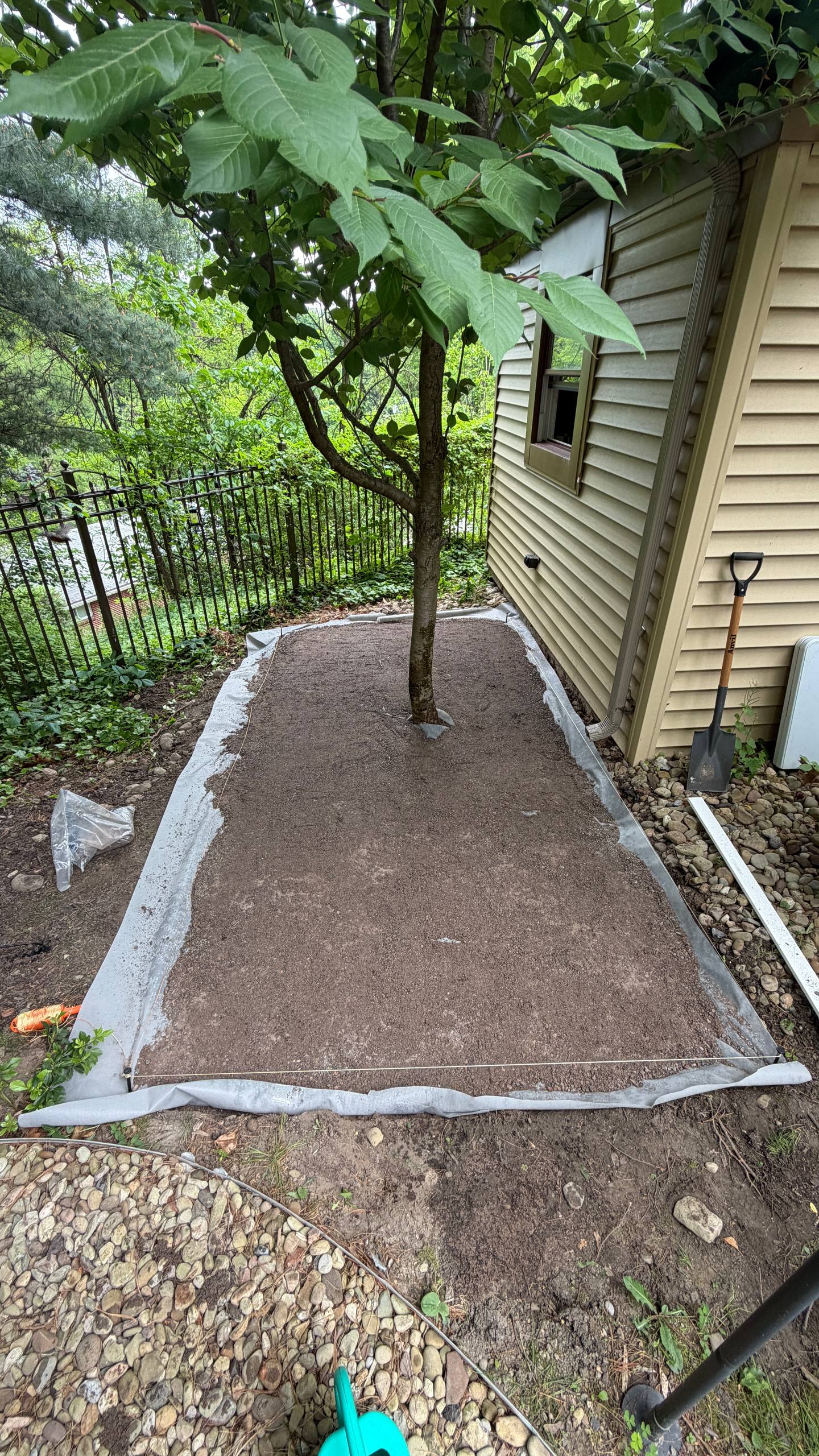 SIDE YARD PAVER PATIO TRANSFORMATION